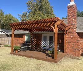 Enhance your outdoor space with this stylish wooden pergola, perfect for relaxing, dining, or entertaining guests in your backyard. Beautiful wooden pergola providing shade and outdoor seating for relaxing or entertaining.