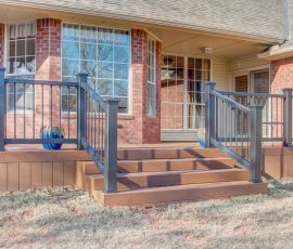 Beautiful backyard deck featuring a contemporary railing and stairs, ideal for outdoor gatherings and enhancing your home's exterior. Outdoor deck with stylish black railing and stairs, perfect for relaxing and entertaining in your ba.