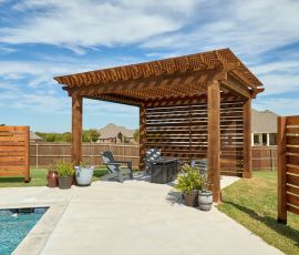 Beautiful backyard pergola with privacy slats, outdoor seating, and a view of the pool, perfect for outdoor gatherings. Stylish wooden backyard pergola with privacy slats and outdoor seating area for relaxing and enterta.